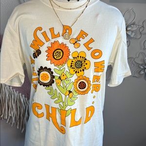 New T-Shirt. Never worn! Smoke and pet free home